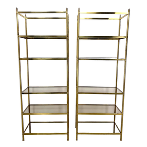 PAIR OF BILLY BALDWIN STYLE BRASS ETAGERES WITH SMOKED GLASS SHELVES