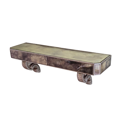 ANTIQUED MIRROR WALL MOUNT CONSOLE WITH DRAWERS AND SILVERED SCROLL SUPPORTS
