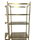 PAIR OF BILLY BALDWIN STYLE BRASS ETAGERES WITH SMOKED GLASS SHELVES