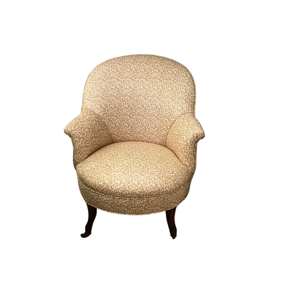 ENGLISH FIRESIDE CHAIR NEWLY UPHOLSTERED IN A QUADRILLE BEIGE CHINTZ