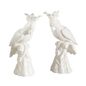 PAIR OF WHITE GLAZED PORCELAIN PARROTS