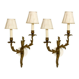 A PAIR OF TWO ARM LOUIS XV STYLE BRONZE SCONCES