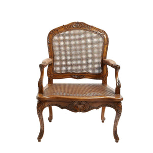 LOUIS XV STYLE CANE AND CARVED WALNUT FAUTEUIL
