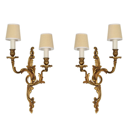 PAIR OF ROCOCO GILT BRONZE TWO ARM WALL SCONCES