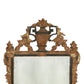 ANTIQUE MIRROR WITH GILT CARVED URN CREST AND GARLAND DETAIL