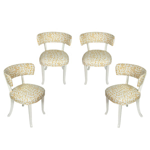 SET OF FOUR WHITE PAINTED KLISMOS CHAIRS WITH YELLOW LES TOUCHES FABRIC