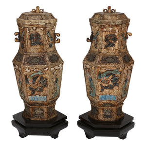 PAIR OF VINTAGE ASIAN CARVED HARD STONE URNS ON STANDS WITH INTRICATE DETAIL