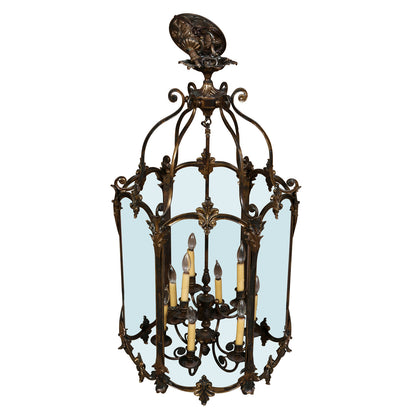 NINE LIGHT LANTERN WITH GLASS PANELS AND DECORATIVE BRASS DETAIL