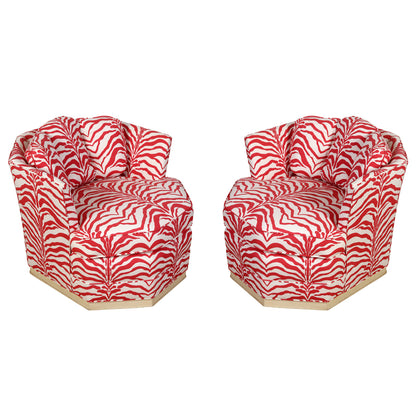PAIR OF MID CENTURY SWIVEL CHAIRS NEWLY UPHOLSTERED IN SISTER PAIRSH RED ZEBRA CHINTZ