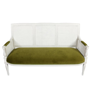 PAINTED CANE SETTEE WITH GREEN VELVET SEAT