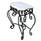 A PAIR OF IRON CONSOLES WITH STONE TOP