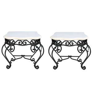 A PAIR OF IRON CONSOLES WITH STONE TOP