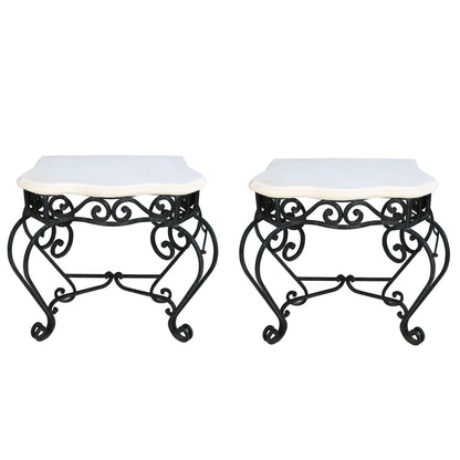A PAIR OF IRON CONSOLES WITH STONE TOP