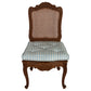 SET OF FOUR CARVED FRENCH CHAIRS WITH CANE BACK AND BLUE SILK STRIPE CUSHIONS