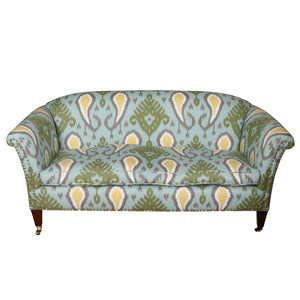 VINTAGE ENGLISH ROLL ARM UPHOLSTERED SETTEE IN BLUE & GREEN IKAT WITH NAILHEAD TRIM