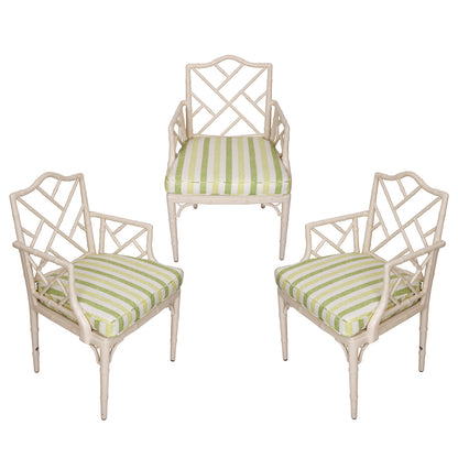 SET OF THREE WHITE PAINTED BAMBOO CHAIRS WITH GREEN STRIPED FABRIC SEATS