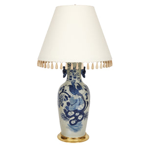 LARGE BLUE AND WHITE CHINOISERIE LAMP AND WHITE SHADE WITH TASSELS