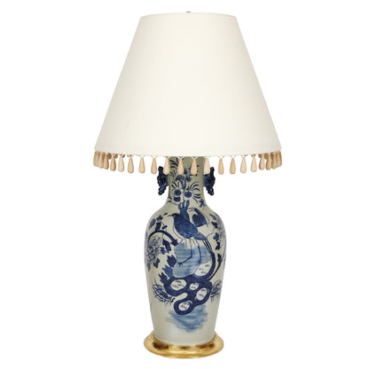 LARGE BLUE AND WHITE CHINOISERIE LAMP AND WHITE SHADE WITH TASSELS