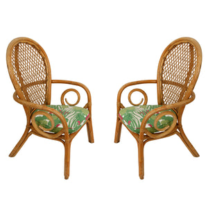 PAIR OF VINTAGE RATTAN FAN BACK CHAIRS WIT SCHUMACHER GREEN AND PINK FABRIC