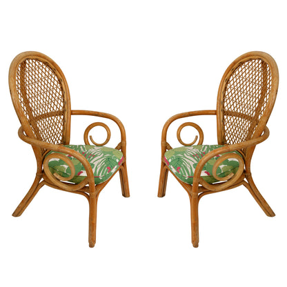 PAIR OF VINTAGE RATTAN FAN BACK CHAIRS WIT SCHUMACHER GREEN AND PINK FABRIC