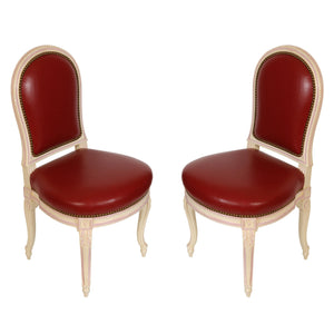 PAIR LOUIS XVI JANSEN STYLE PAINTED SIDE CHAIRS WITH LEATHER UPHOLSTERY AND NAILHEAD DETAIL