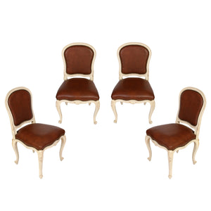 SET OF FOUR LOUIS XV STYLE PAINTED SIDE CHAIRS WITH BROWN LEATHER