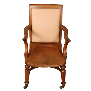 VINTAGE ENGLISH LIBRARY CHAIR WITH UPHOLSTERED LEATHER BACK AND CASTERS