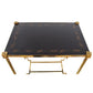MAISON JANSEN BRASS SIDE TABLE WITH GILT AND EBONIZED TOP