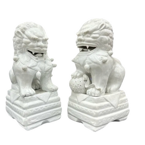 PAIR OF WHITE CERAMIC LIONS