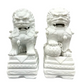 PAIR OF WHITE CERAMIC LIONS