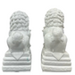 PAIR OF WHITE CERAMIC LIONS