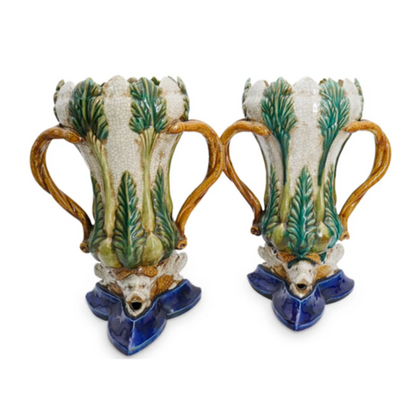 PAIR OF PALM MOTIF MAJOLICA GLAZED VASES WITH DOLPHIN BASE