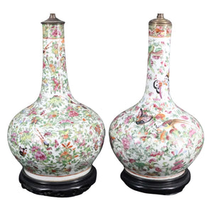 PAIR OF FAMILLE ROSE PORCELAIN LAMPS ON CARVED WOOD BASE