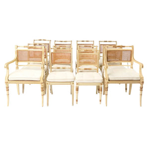 ALMOST SET OF TWELVE REGENCY PARCEL GILT DINING CHAIRS