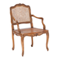 ANTIQUE LOUIS XV STYLE CARVED WALNUT AND CANE FAUTEUIL