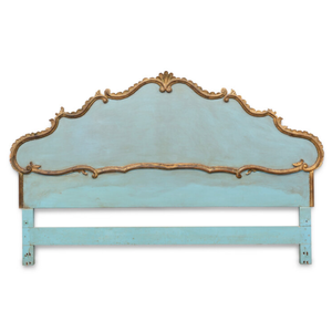 A CONTINENTAL PARCEL-GILT HEADBOARD
