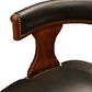 REGENCY STYLE LEATHER UPHOLSTERED BARREL BACK ARMCHAIR