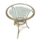 HOLLYWOOD REGENCY GILT IRON AND GLASS GUERIDON SIDE TABLE