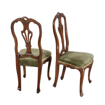SET OF FOUR CARVED WALNUT DINING CHAIR WITH CABRIOLE LEGS