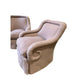 PAIR OF ROLL ARM SWIVEL CHAIRS FULLY UPHOLSTERED IN PINK LINEN