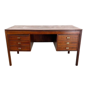 MODERNIST ROSEWOOD DESK WITH FOUR DRAWERS