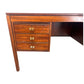 MODERNIST ROSEWOOD DESK WITH FOUR DRAWERS