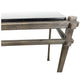 PAIR OF SILVERED IRON CONSOLE TABLES WITH BLACK GRANITE TOP