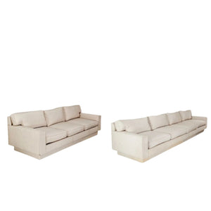 ALMOST PAIR OF CREAM MODERNIST SOFAS
