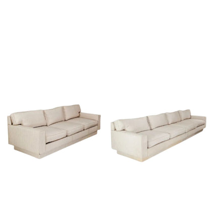 ALMOST PAIR OF CREAM MODERNIST SOFAS