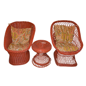 ALMOST PAIR OF VINTAGE RATTAN RED BUCKET CHAIRS & AN END TABLE