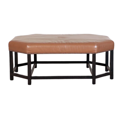 HEXAGONAL FAUX LEATHER OTTOMAN WITH BLACK PAINTED BASE