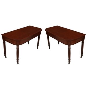 PAIR OF VINTAGE MAHOGANY DEMI LUNE TABLES WITH FLUTED LEGS AND WHEELS