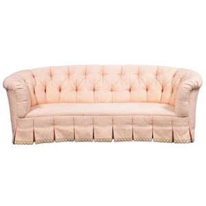 PALE PINK BUTTON TUFTED UPHOLSTERED SOFA WITH PLEATED SKIRT