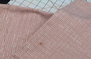 ORANGE AND WHITE SMALL PRINT THROW PILLOW